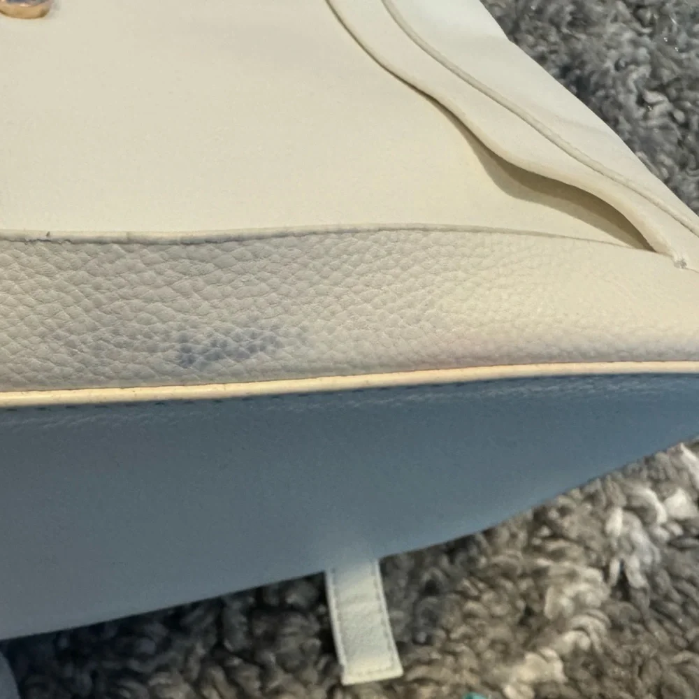 Chic Cream Backpack with Tassel Accent